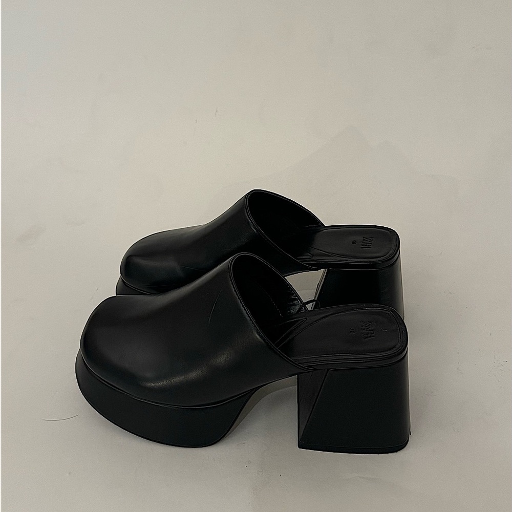 Black chunky clogs